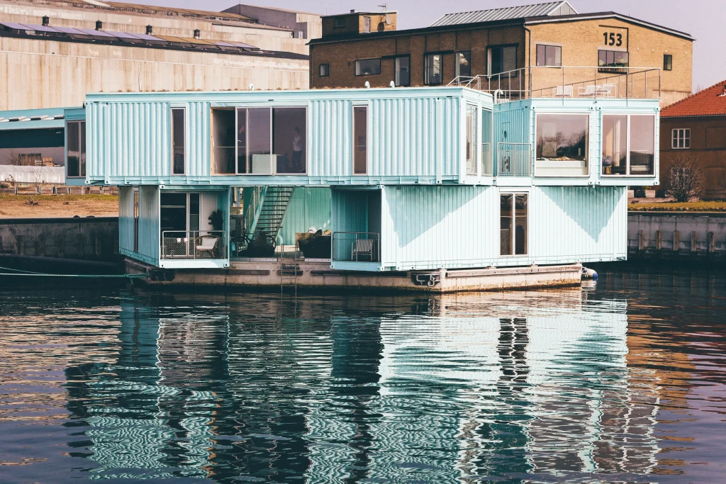 1-large-shot-light-blue-house-dock-body-water